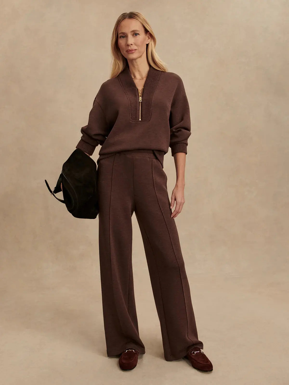 Model wearing Sally Half-Zip Sweat in Coffee Bean Marl styled for fall athleisure