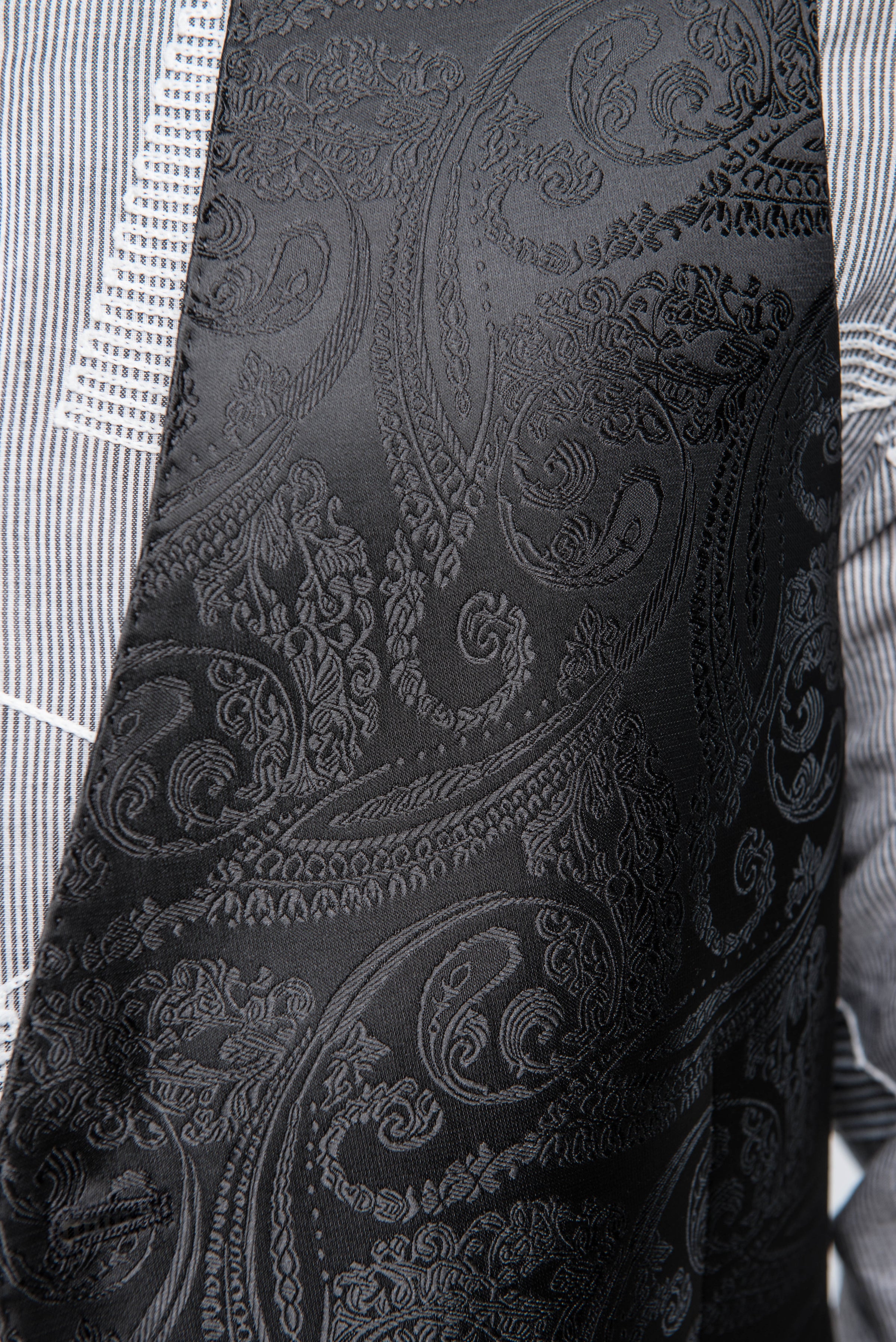 Close-up of all-black paisley pattern