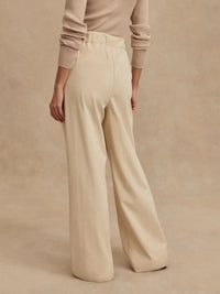 Back view of Rocio pants with mock welt pockets and elasticated waistband