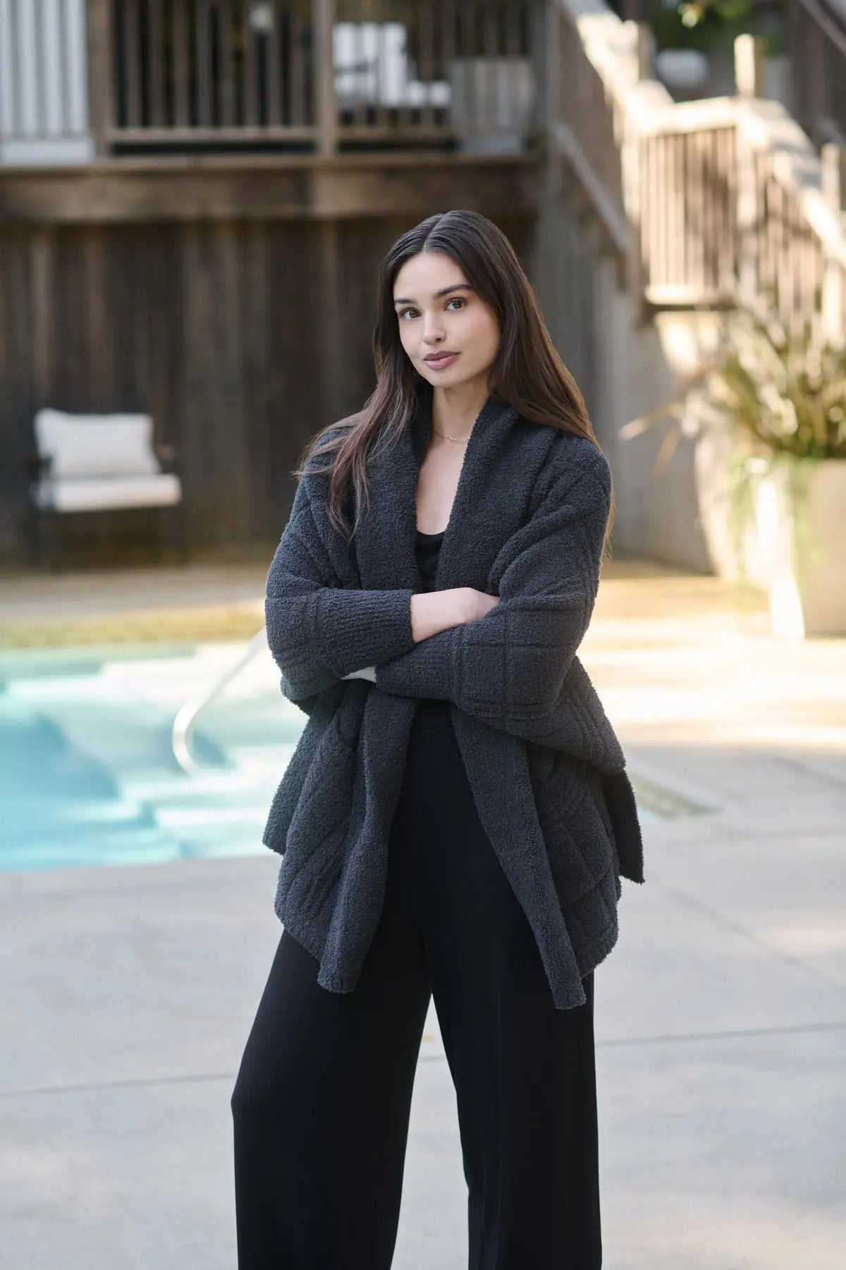 Model wearing CozyChic® Cotton Tonal Plaid Blanket Wrap by Barefoot Dreams in black