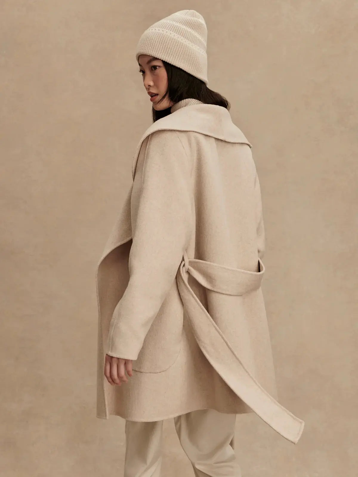 Close-up of detachable waist belt and pocket details