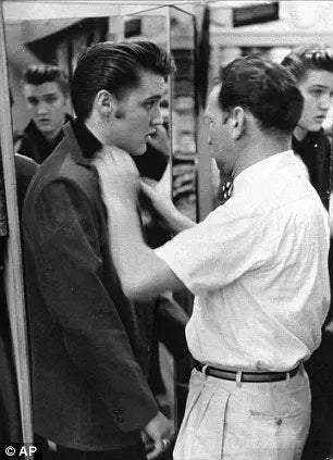 LISTEN-ELVIS-BERNARD-LANSKY.-ELVIS-TRADES-HIS-CAR-FOR-A-2-1-2-HOUR-SHOPPING-SPREE-AT-LANSKY-S-ON-FAMOUS-BEALE-STREET. Lansky Bros.