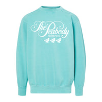 Light blue sweatshirt with 'The Peabody Memphis' text and duck graphics on a white background
