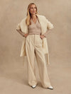 Model wearing Rocio 29.5" Pants in Birch, styled for everyday athleisure