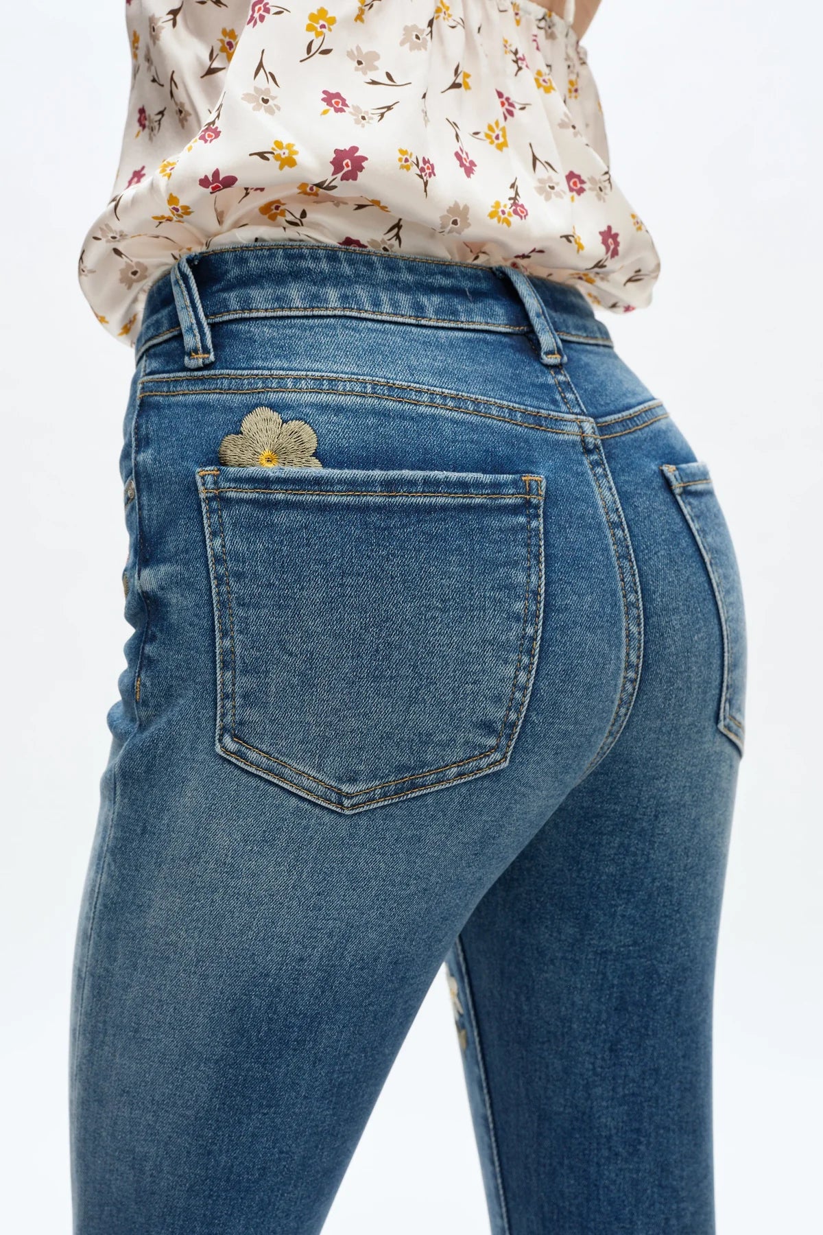 Flora Mid Rise Bootcut Jeans