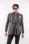 Man wearing a striped blazer with a white background