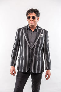 Man wearing a striped blazer with a white background