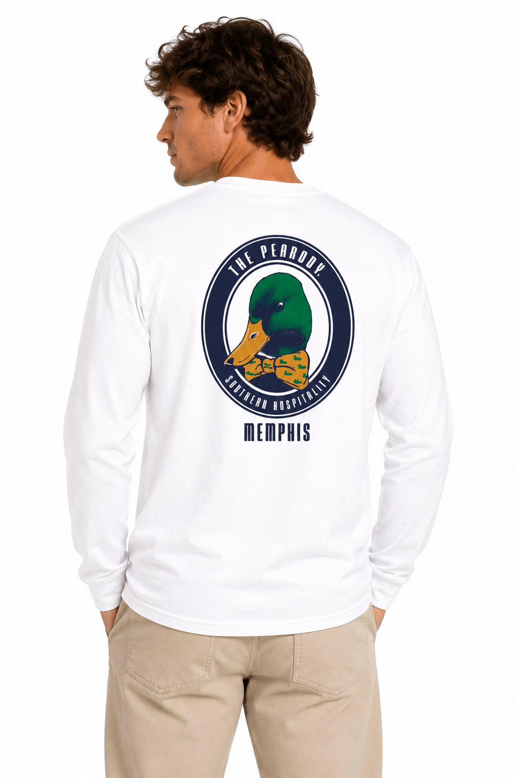 A man faces away, glancing over his shoulder, wearing The Peabody Pocket Long-Sleeve featuring a circular mallard duck logo and "The Peabody, Southern Hospitality, Memphis" printed on the back.