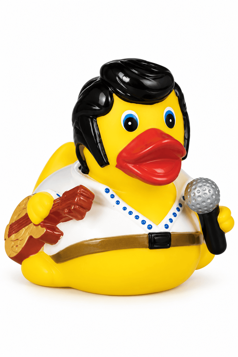 Yellow Elvis-inspired rubber duck with black pompadour, white jumpsuit, guitar, and microphone.