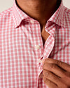Close-up of hidden button-down collar and French front placket