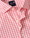 Close-up of hidden button-down collar and French front placket