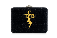 Black beaded clutch with gold 'tcb' and lightning bolt design on a white background