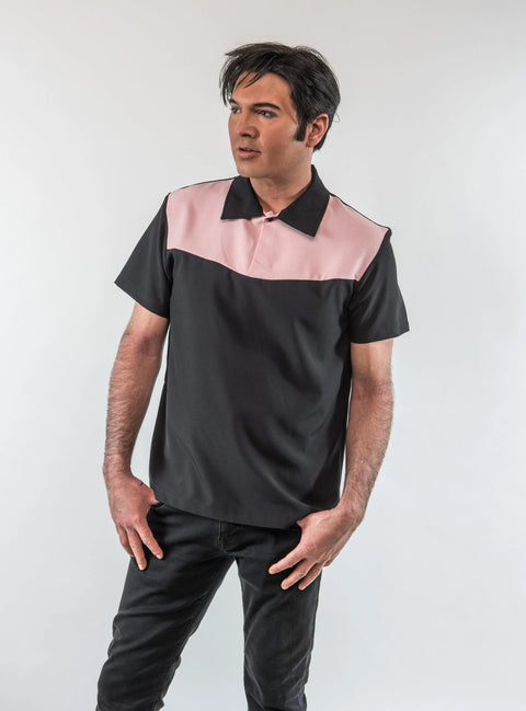 Man wearing a black and pink shirt against a white background