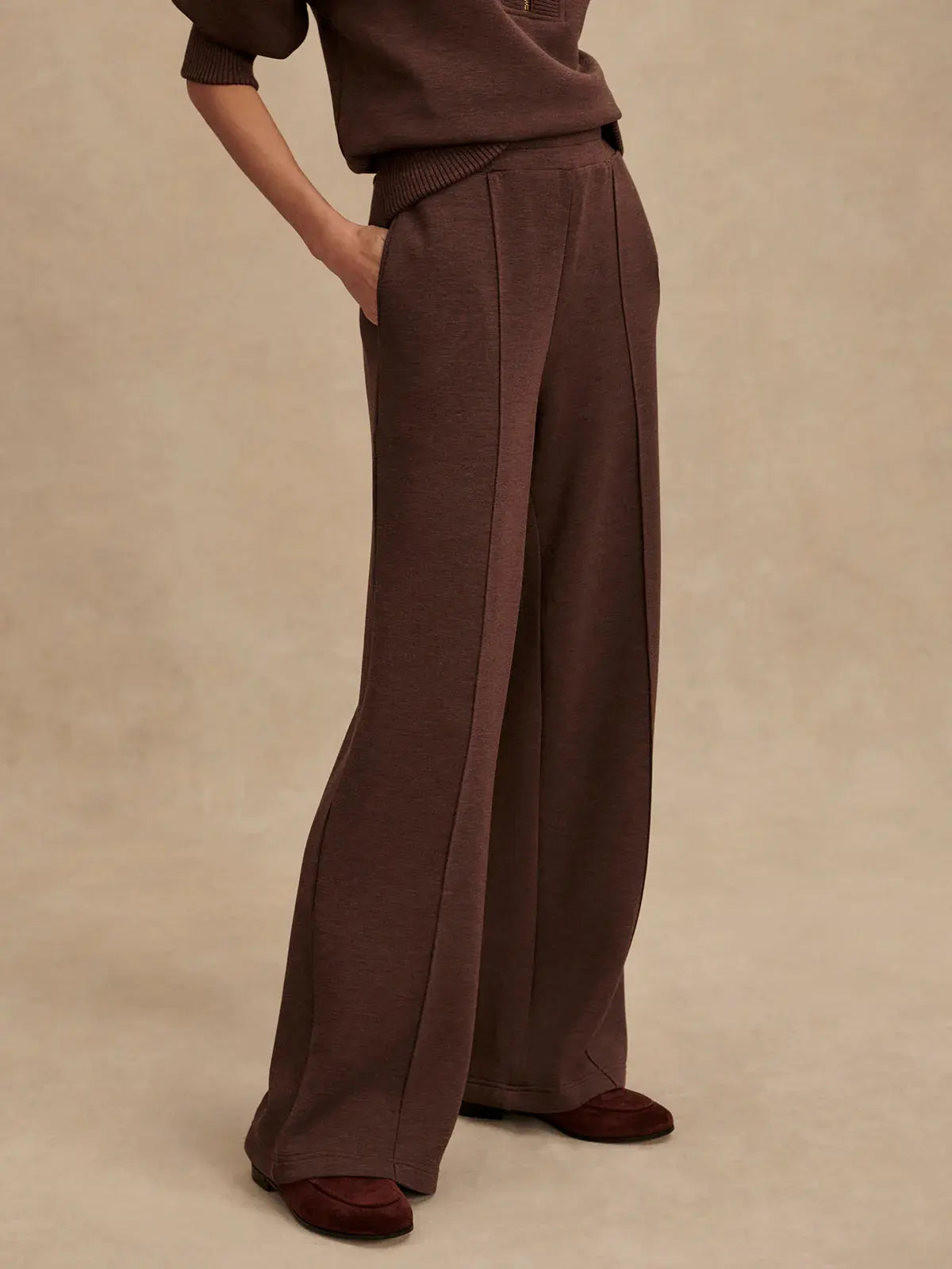 Front view of Varley Wide Leg Pant 30" in Coffee Bean Marl, high-rise waist with pink tuck detailing
