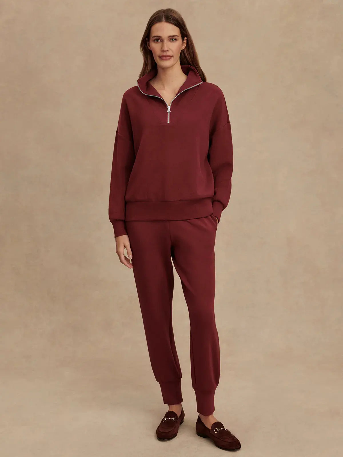 Detail of cuffed hem on Varley Slim Cuff Pant, New Maroon