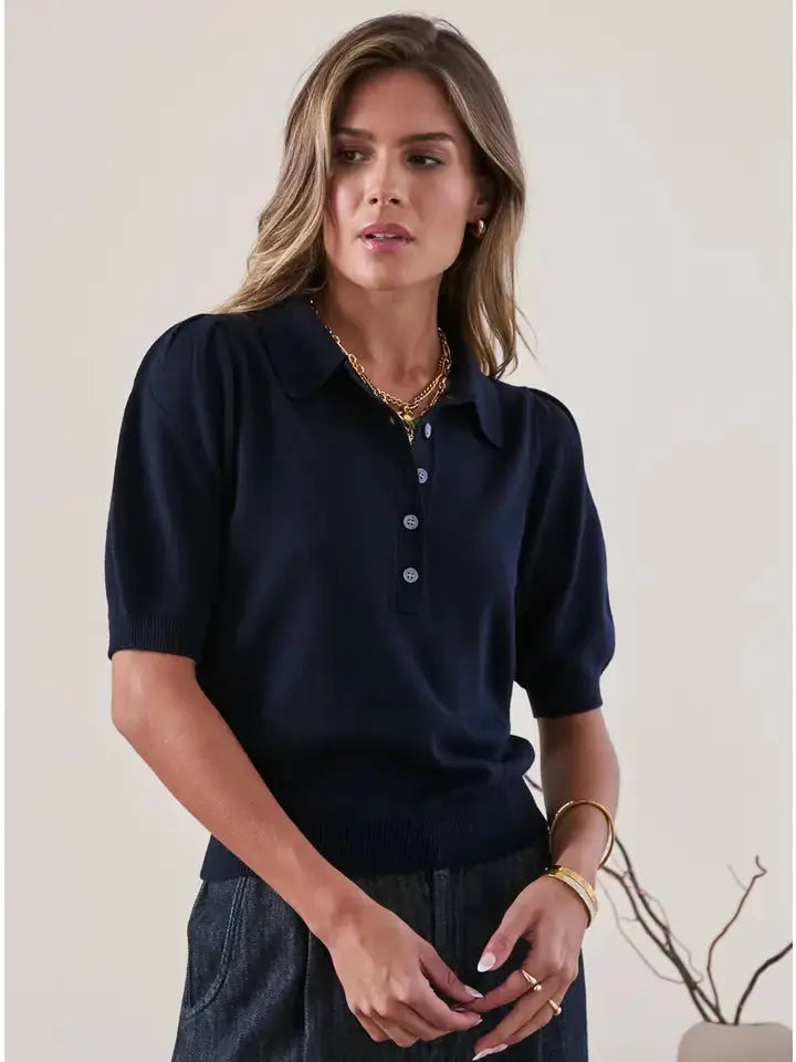 Navy ribbed short-sleeve polo knit top with pointelle stitch and puff shoulders