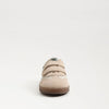 Front angle of ivory leather Talia sneaker showing rounded toe and sleek contrast detailing