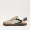 Side view of Talia Slip On Sneaker in ivory haze leather with double Velcro straps and platform sole.