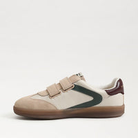 Side view of Talia Slip On Sneaker in ivory haze leather with double Velcro straps and platform sole.