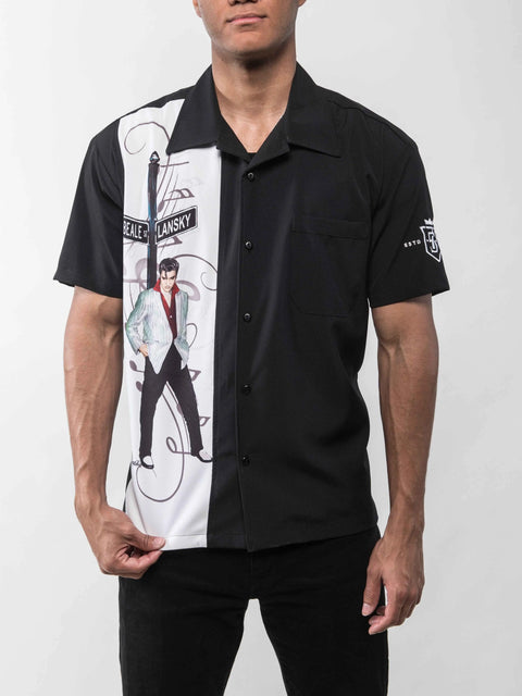Elvis Presley illustration under the Beale St. sign, designed by Betty Harper, featured on a 75th Anniversary short sleeve sport shirt with embroidered anniversary logo on left sleeve.