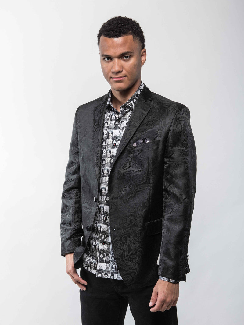 Angled view of the Lansky Bros. Limited Edition Wedding Jacket, highlighting the black paisley pattern and Clothier to the King label.