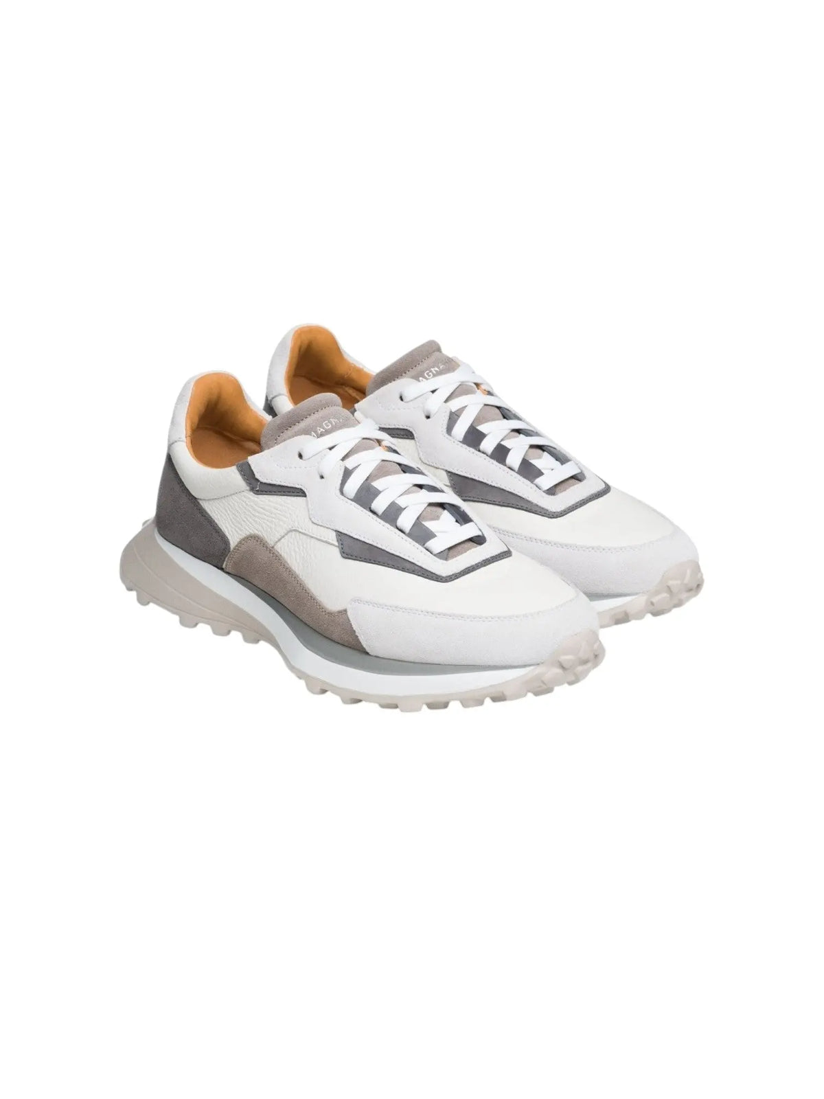 Angled view of Magnanni Onyx Sneaker from the Tech Runner series, showcasing a mix of suedes, perforated calfskin, and tumbled leathers with a modern sports sole.