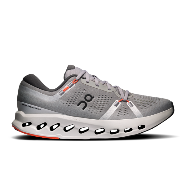 A gray Under Armour running shoe with a white midsole and small red and black accents, shown from a side profile on a white background.