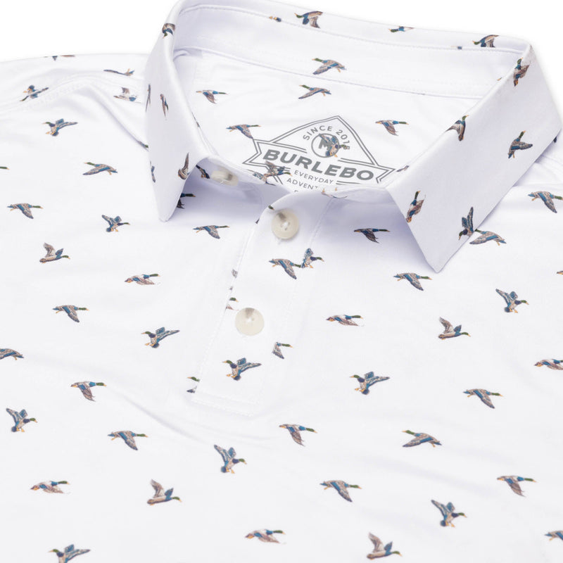 Ducks Flying in Performance Polo