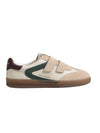 Side view of Talia Slip On Sneaker in ivory haze leather with double Velcro straps and platform sole